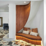 Curved timber reading nook with feature stone floor at Maleny Country Estate House, Sunshine Coast Hinterland