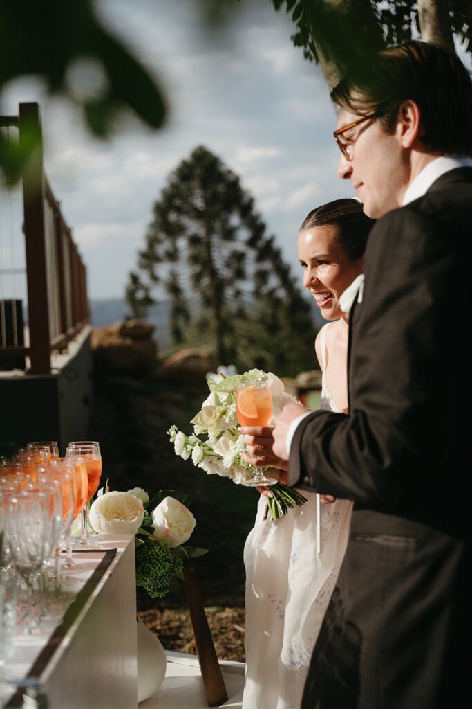 Bride and Groom at cocktail hour drinks at Maleny Country Estate wedding, Sunshine Coast Hinterland